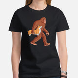 Corgi Dog Themed Clothes - Gifts for Dog Moms, Dads & Lovers - Funny Canine Tee Shirts For Humans - Bigfoot Carrying A Puppy T-Shirt - Black, Women