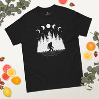 Yeti, Sasquatch & Moon Phases Astronomy Adventure Tee for Camping & Outdoor Fun - Bigfoot Walking In The Pine Forest Squatchy Shirt - Black